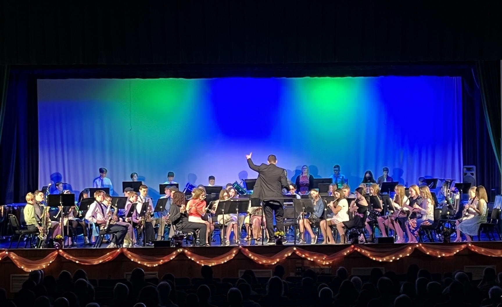Mr. Pyles leads the 7th and 8th-grade band