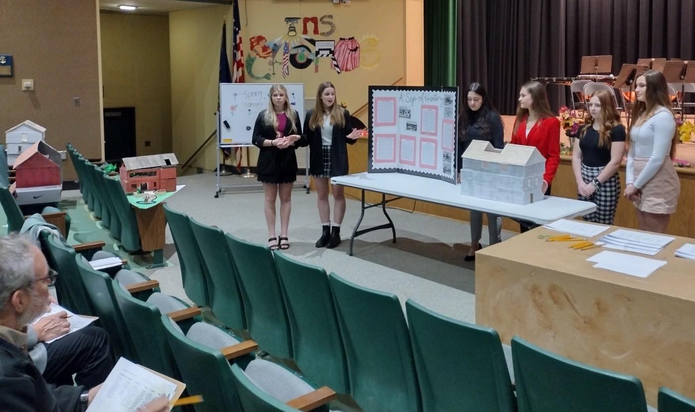 One of the teams presents to the judges