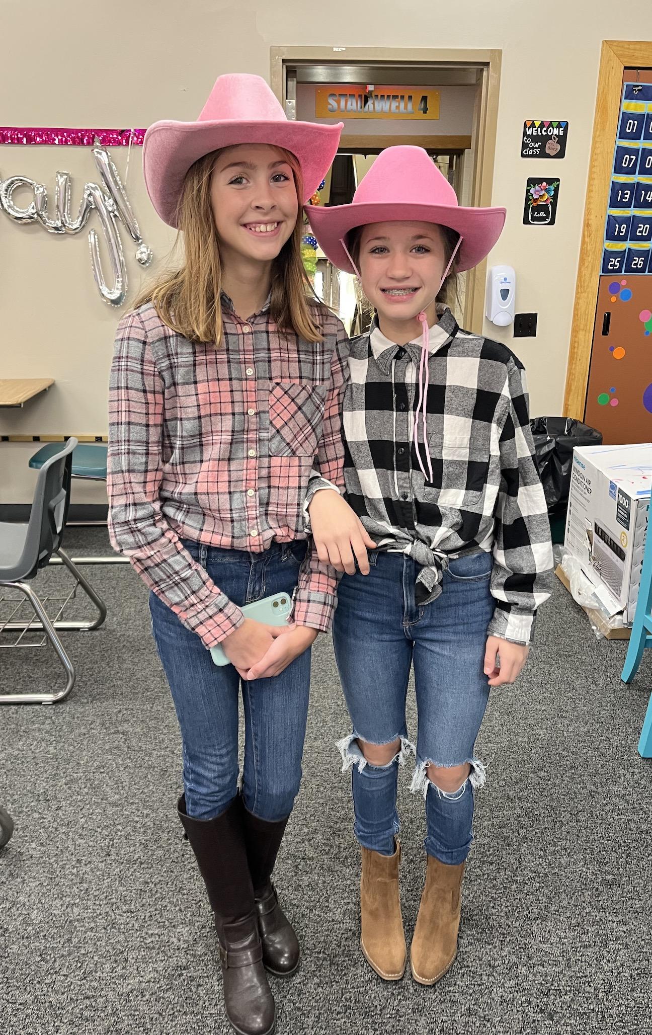 Ivy Willis and Lexie Whalen celebrate Western Day at Penn Middle School