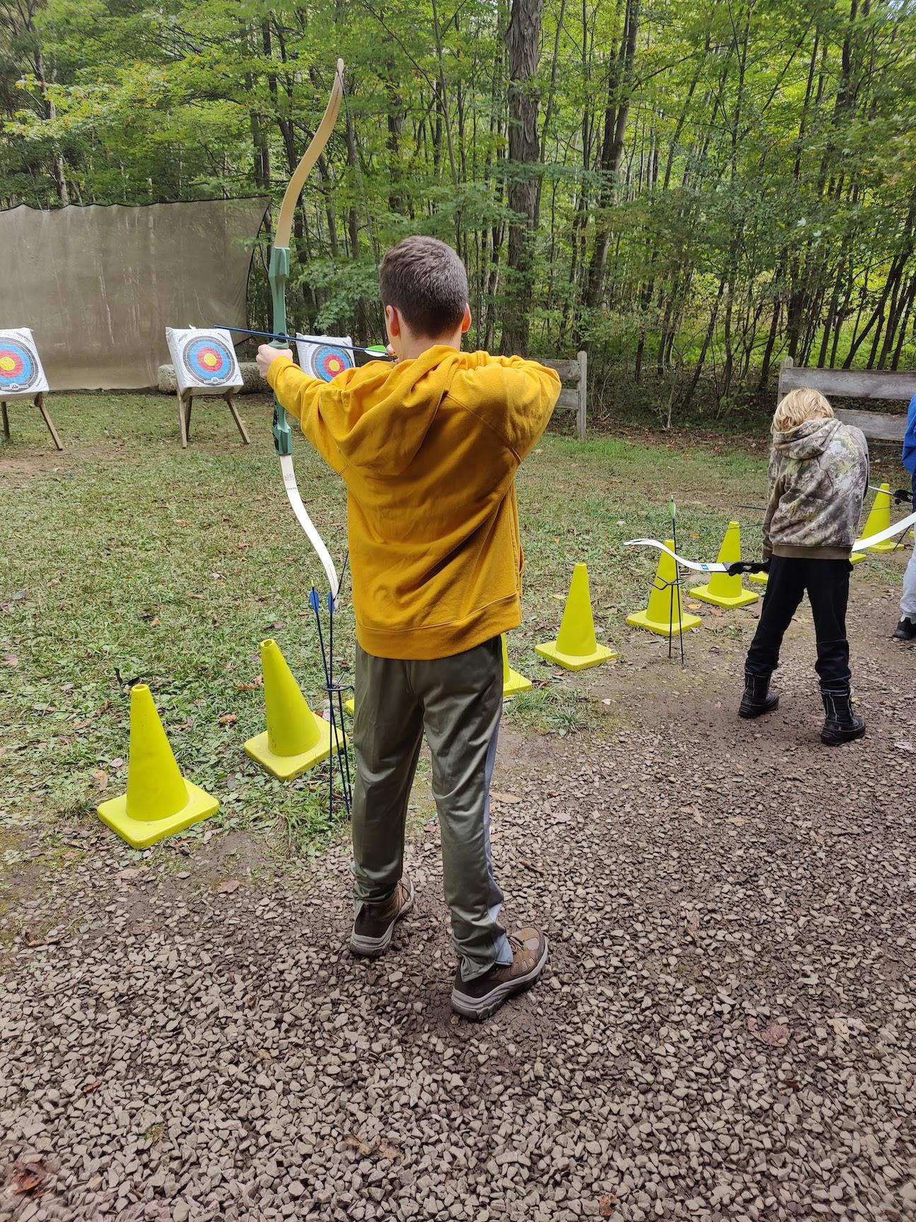Penn Middle 6th grader, Zach Moors, spends time at the archery range