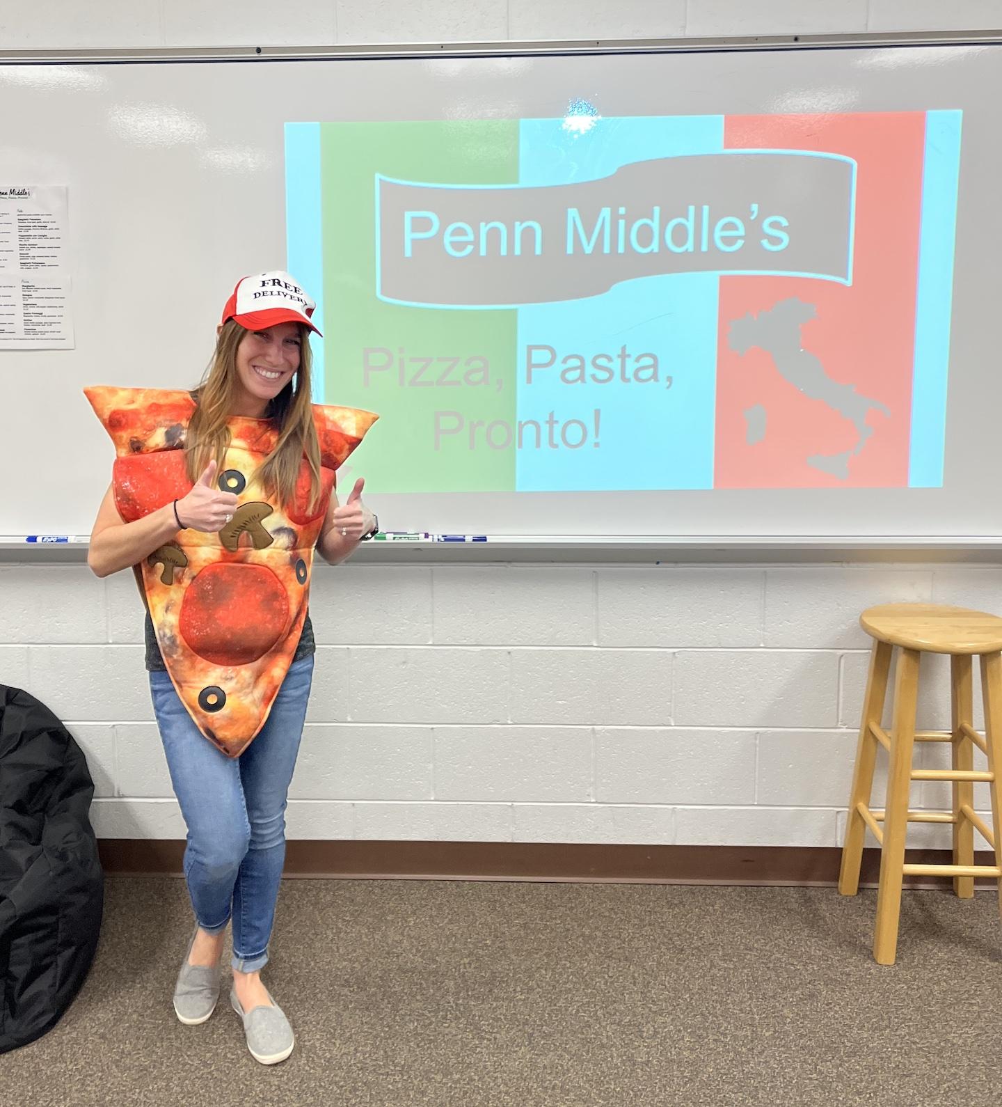 Mrs. Wentroble dressed like pizza to embrace the theme
