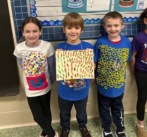Mrs. MacArthur’s 2nd graders at Sunrise Estates Elementary wore shirts with 100 items; Norah Barton, Wesley Eck, and Landon Baughman