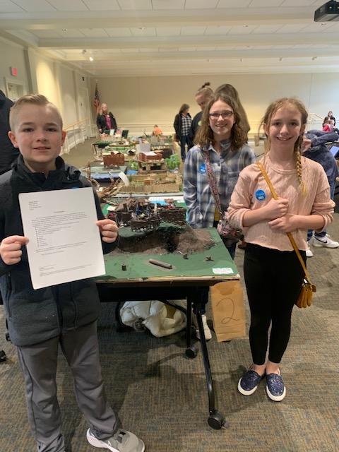 students with their fort model