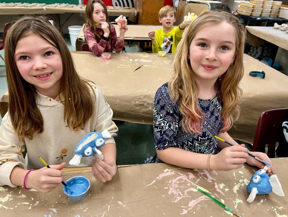 McCullough Elementary 3rd-graders work on their clay fish; (front) Sienna Zemba, Coraline Ward, (back) Cina Castelli, and Julian Bressan