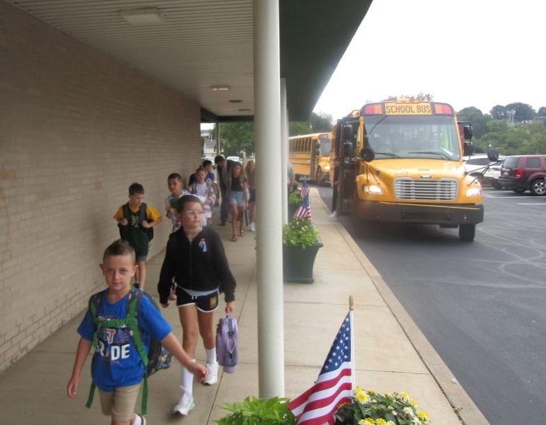 Students arrive at school on day one